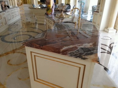 Fusion WOW quartz kitchen island countertop polished to a mirror finish by MarblePro — luxury villa in Dubai, UAE