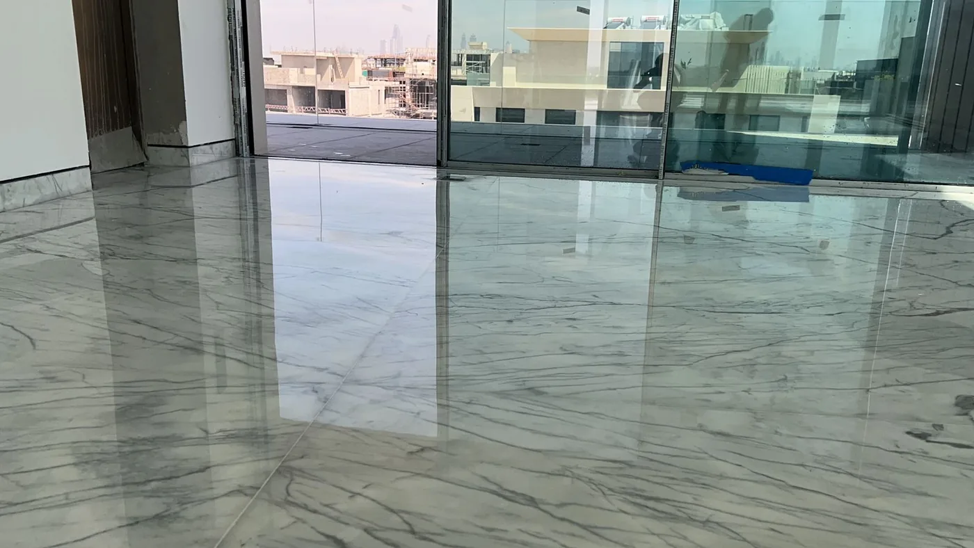 Polished marble floor restored to a high-gloss mirror finish by MarblePro — real villa project in Dubai, UAE